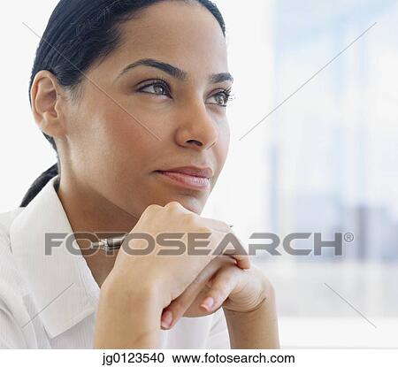 Stock Image - Close up of African businesswoman. Fotosearch