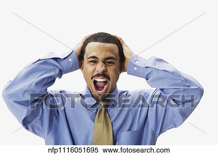 African businessman yelling with hands on head View Large Photo Image Stock Photography - African businessman yelling with hands on head. Fotosearch