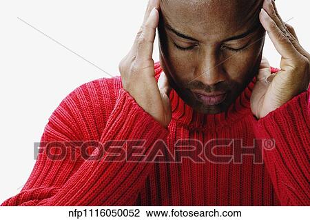 African man rubbing his temples View Large Photo Image Stock Image - African man rubbing his temples. Fotosearch
