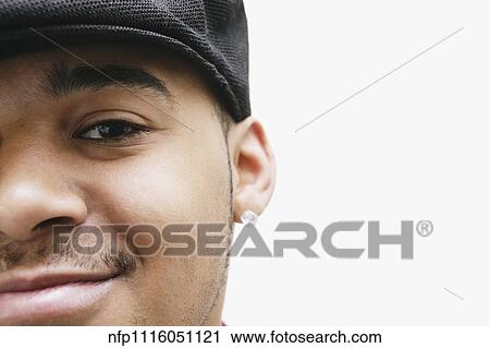 Close up of African man smiling View Large Photo Image Stock Image - Close up of African man smiling. Fotosearch