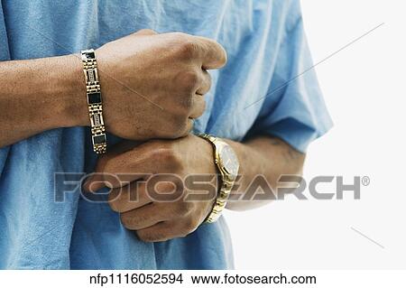 Picture - Close up of African man wearing jewelry. Fotosearch