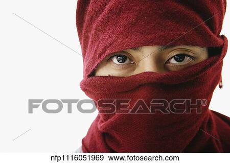 Stock Photo - Pacific Islander man with scarf covering head and face. Fotosearch