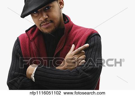 Portrait of African man with arms crossed View Large Photo Image Stock Image - Portrait of African man with arms crossed. Fotosearch
