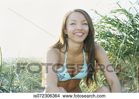 Picture - Portrait of African woman in bikini. Fotosearch