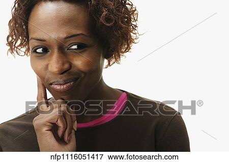 Portrait of African woman thinking View Large Photo Image Stock Photo - Portrait of African woman thinking. Fotosearch
