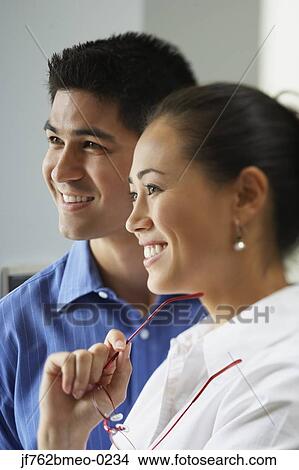 Picture - Portrait of Asian businesspeople in office. Fotosearch