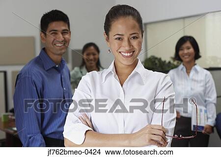 Picture - Portrait of Asian businesspeople in office. Fotosearch