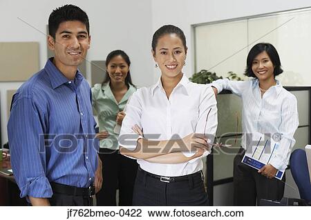 Stock Image - Portrait of Asian businesspeople in office. Fotosearch