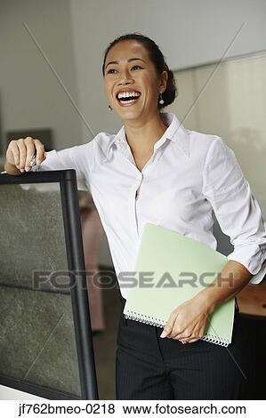 Portrait of Asian businesswoman laughing View Large Photo Image Stock Photo - Portrait of Asian businesswoman laughing. Fotosearch