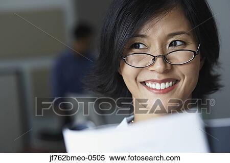 Stock Photography - Portrait of Asian businesswoman wearing eyeglasses . Fotosearch