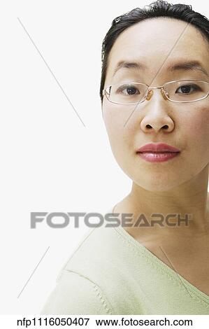 Portrait of Asian woman wearing eyeglasses View Large Photo Image Stock Photo - Portrait of Asian woman wearing eyeglasses. Fotosearch