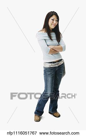 Portrait of Asian woman with arms crossed View Large Photo Image Stock Photo - Portrait of Asian woman with arms crossed. Fotosearch