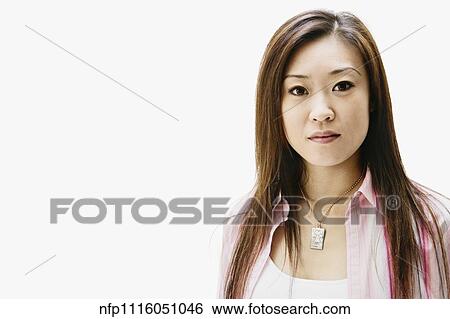 Stock Photograph - Portrait of Asian woman with long hair. Fotosearch