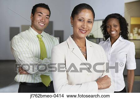 Portrait of multi-ethnic businesspeople in office View Large Photo Image Picture - Portrait of multi-ethnic businesspeople in office. Fotosearch