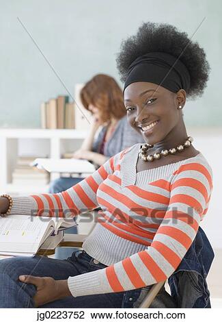 Stock Image - African female college student in class. Fotosearch