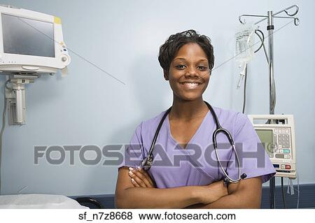 African female nurse smiling in hospital room View Large Photo Image Stock Photo - African female nurse smiling in hospital room. Fotosearch