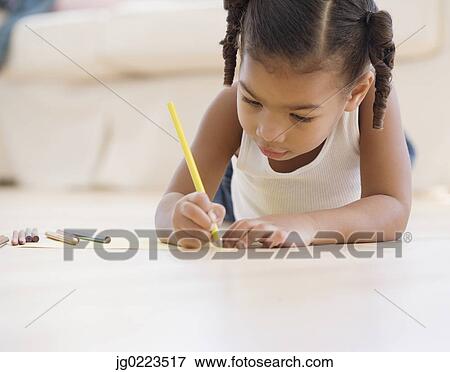 African girl coloring on floor View Large Photo Image Stock Photo - African girl coloring on floor. Fotosearch