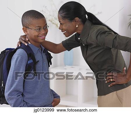 Stock Photo - African mother hugging son. Fotosearch