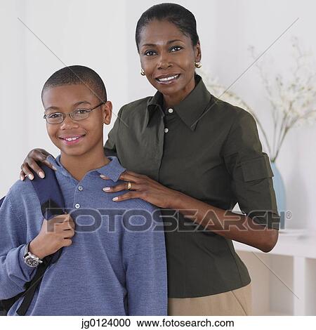 African mother standing with son View Large Photo Image Stock Image - African mother standing with son. Fotosearch