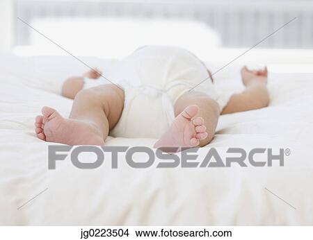 Close up of newborn baby’s feet View Large Photo Image Picture - Close up of newborn baby’s feet . Fotosearch