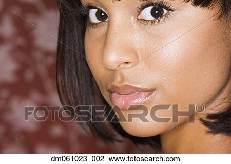 Close up of young Hispanic woman’s face View Large Photo Image Stock Image - Close up of young Hispanic woman’s face. Fotosearch