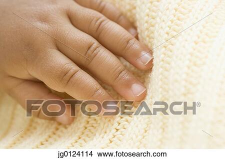 Extreme close up of Hispanic baby’s hand View Large Photo Image Picture - Extreme close up of Hispanic baby’s hand. Fotosearch