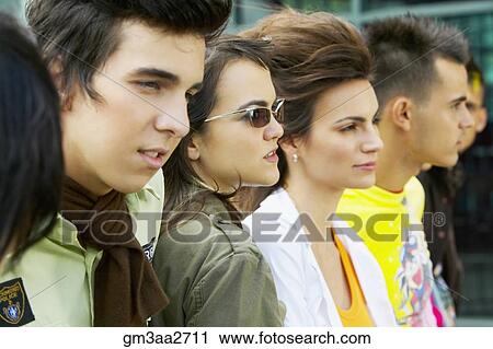 Group of Hispanic young people in a row outdoors View Large Photo Image Stock Image - Group of Hispanic young people in a row outdoors. Fotosearch