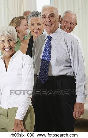 Stock Image - Group of seniors at party. Fotosearch