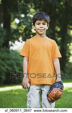 Hispanic boy with baseball glove and ball View Large Photo Image Stock Photo - Hispanic boy with baseball glove and ball. Fotosearch