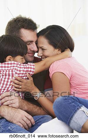 Picture - Indian family hugging. Fotosearch