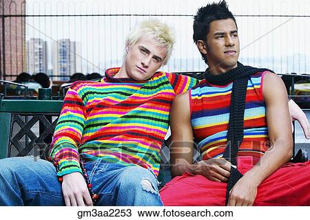 Teenage boys sitting on bench View Large Photo Image Stock Image - Teenage boys sitting on bench. Fotosearch