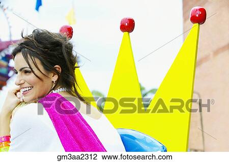 Young Hispanic woman at carnival View Large Photo Image Stock Image - Young Hispanic woman at carnival. Fotosearch