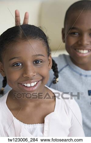 African brother and sister being silly View Large Photo Image Picture - African brother and sister being silly. Fotosearch