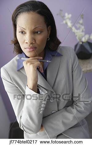 African businesswoman thinking View Large Photo Image Stock Photo - African businesswoman thinking. Fotosearch