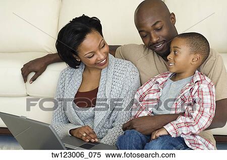 African family smiling at each other View Large Photo Image Stock Photography - African family smiling at each other. Fotosearch