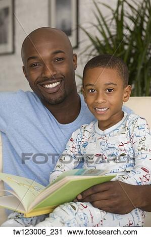 African father and son reading View Large Photo Image Stock Image - African father and son reading. Fotosearch
