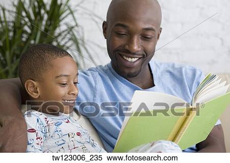 African father and son reading View Large Photo Image Stock Photography - African father and son reading. Fotosearch