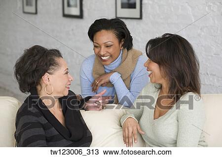 African mother and adult daughters talking View Large Photo Image Stock Image - African mother and adult daughters talking. Fotosearch