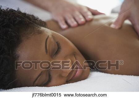 African woman receiving massage View Large Photo Image Stock Photography - African woman receiving massage. Fotosearch