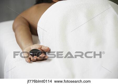 African woman receiving spa treatment View Large Photo Image Picture - African woman receiving spa treatment. Fotosearch