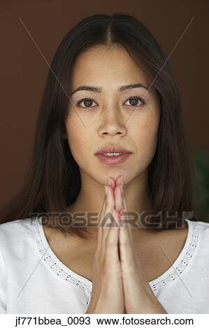 Asian woman meditating View Large Photo Image Stock Image - Asian woman meditating. Fotosearch