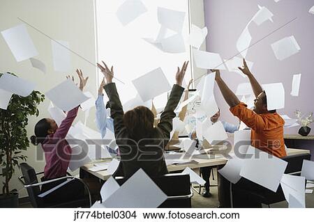 Businesspeople cheering at meeting View Large Photo Image Picture - Businesspeople cheering at meeting. Fotosearch