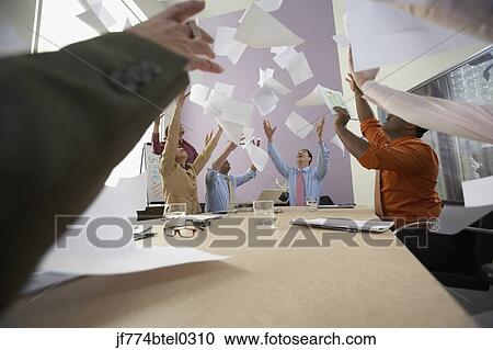 Businesspeople cheering at meeting View Large Photo Image Stock Image - Businesspeople cheering at meeting. Fotosearch