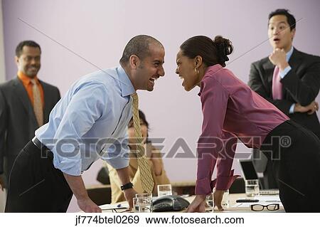 Stock Photo - Businesspeople yelling at each other. Fotosearch