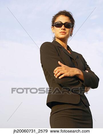 Businesswoman with arms crossed View Large Photo Image Stock Photo - Businesswoman with arms crossed. Fotosearch