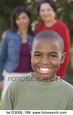 Close up of African boy smiling View Large Photo Image Stock Photo - Close up of African boy smiling. Fotosearch