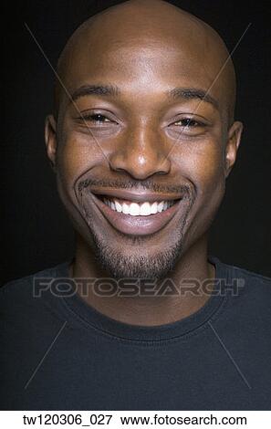 Stock Photo - Close up of African man smiling. Fotosearch