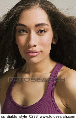 Stock Image - Close up of African woman smiling. Fotosearch