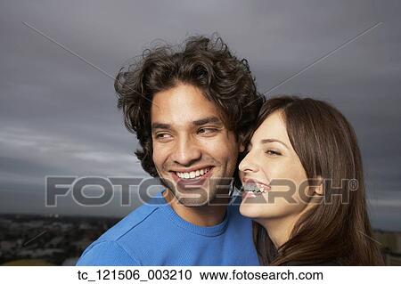 Close up of Hispanic couple smiling View Large Photo Image Stock Image - Close up of Hispanic couple smiling. Fotosearch