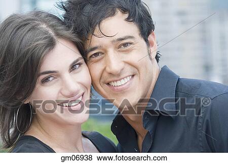 Stock Photo - Close up of Hispanic couple smiling. Fotosearch